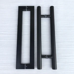 Matte black glass door pulls comparing a square profile on the left with a round H-style profile on the right
