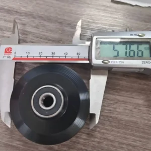 Pilates reformer wheel diameter measured at approximately 57.66mm